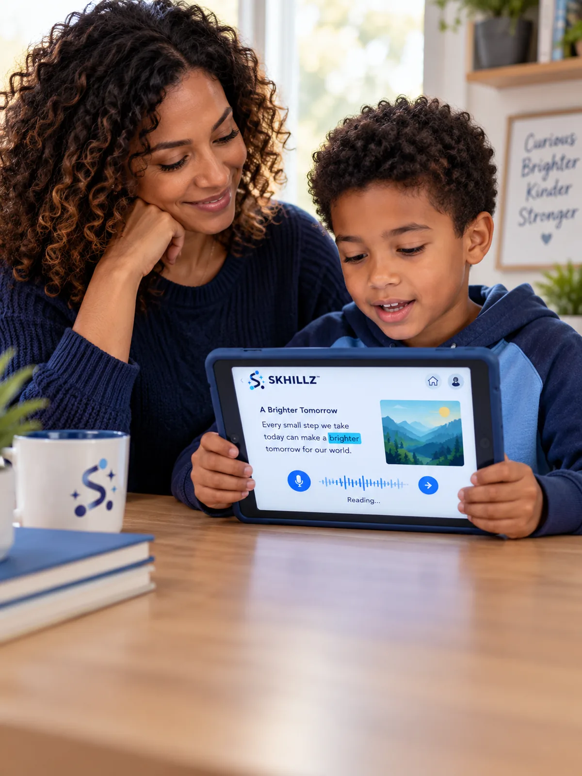 A parent listening while her son reads aloud from a tablet.