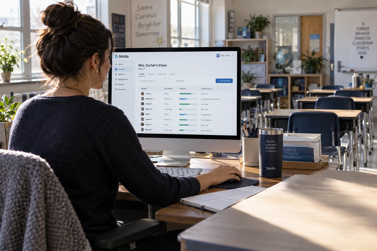A teacher scanning a class dashboard on screen in an empty classroom, morning light.