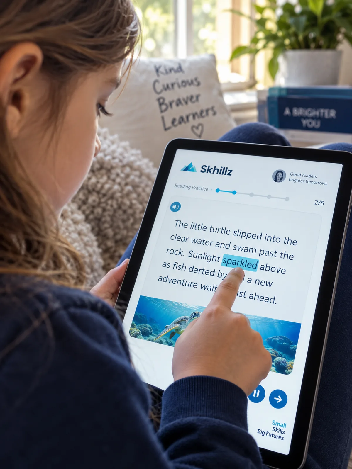 A child tracking a word with a finger while reading from a tablet.